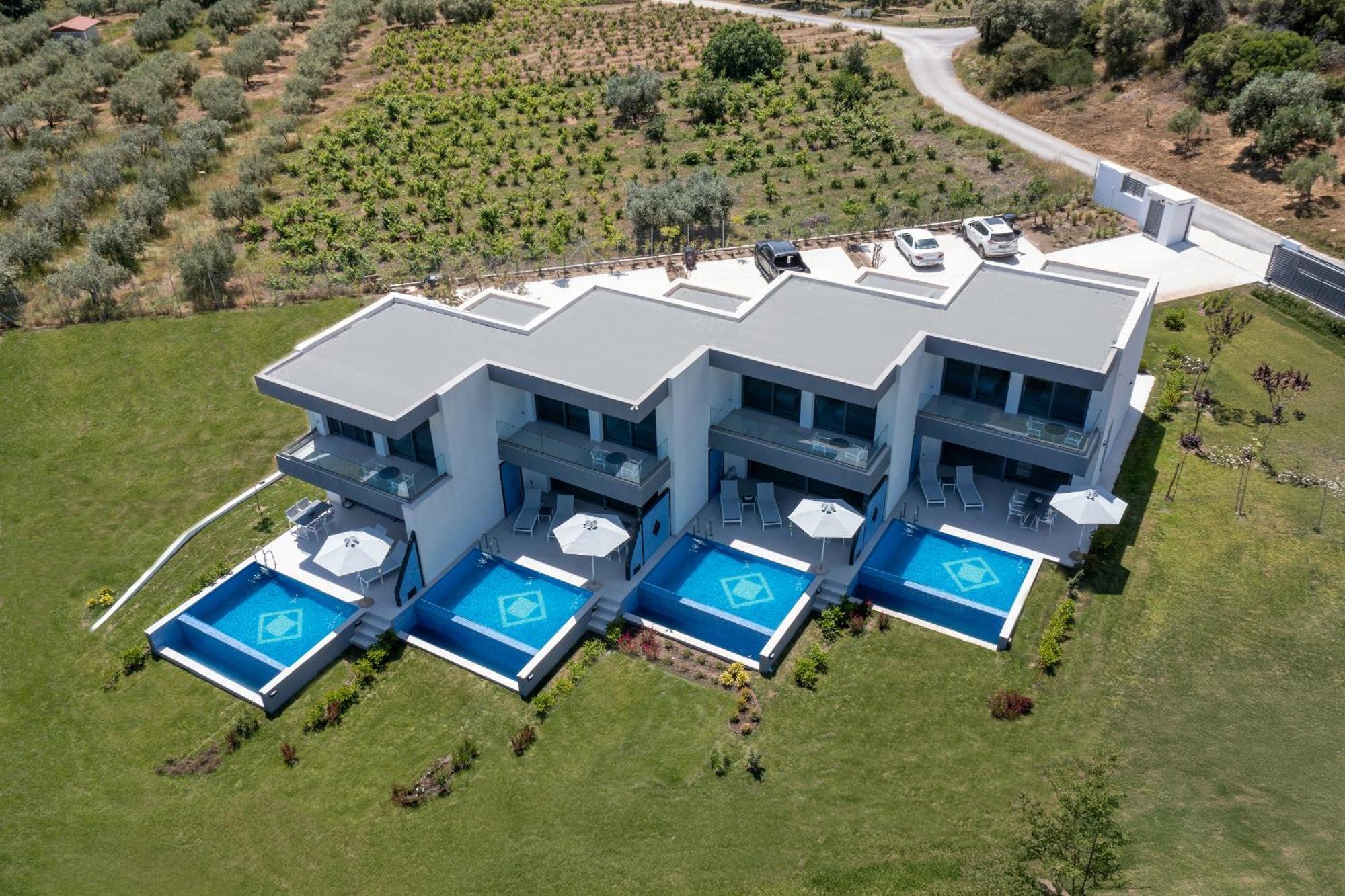 Elysium Villas Quartet Sarti Esterno foto